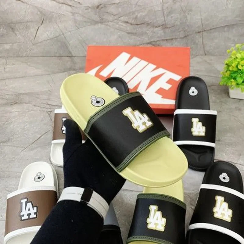 p-photo-2024-12-14-10-59-22-11-12-08-436957.webp Trendy Nike Offcourt LV Edition Flip-Flop For Men (ETS93)